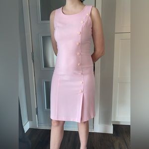Vintage Barbie-style pink dress with button details